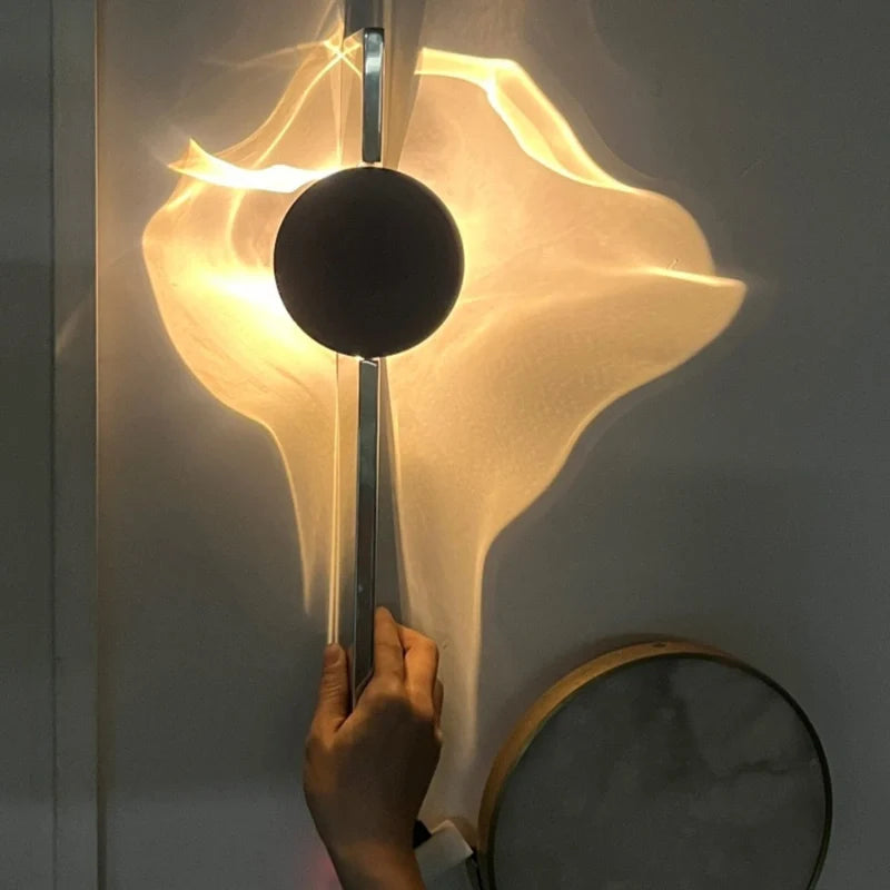 Aplique de pared LED de ondas Olaya en un salón moderno – imagen 10