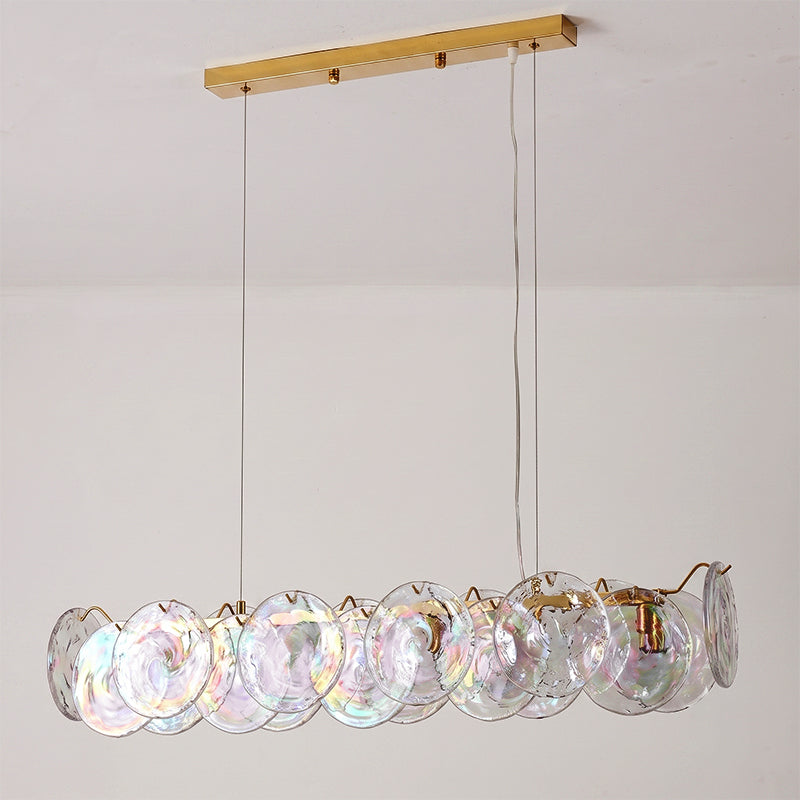 Lámpara colgante lineal Giraza – transparente de 120 cm encendida