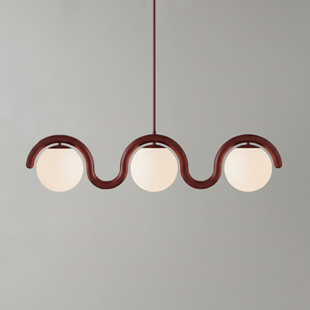 Lámpara araña lineal Bucle – rojo, 3 luces · 109 cm