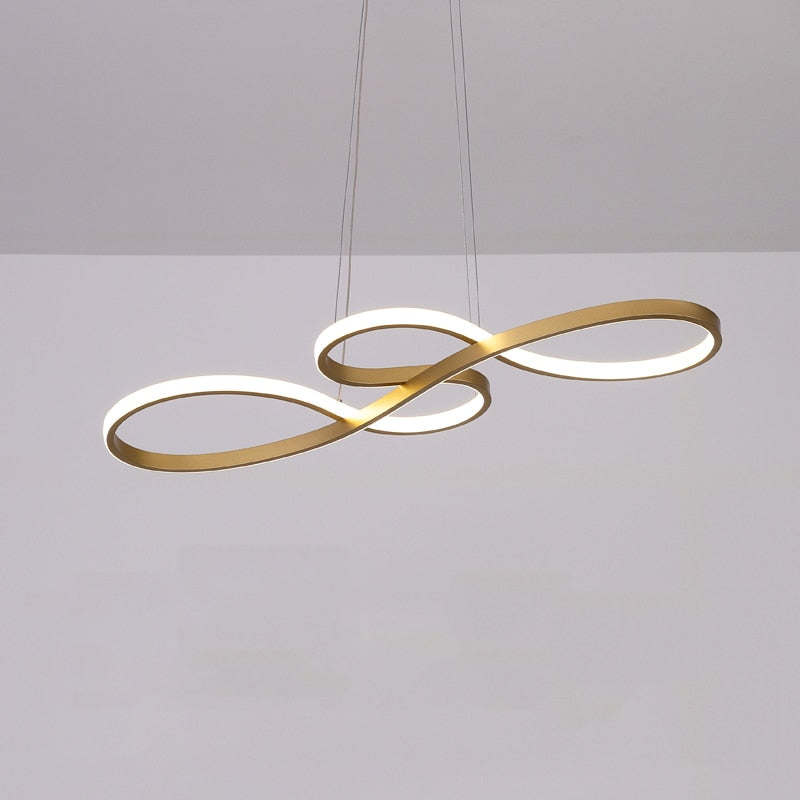 Lámpara colgante LED lineal Sonela sobre una mesa de comedor – imagen 6