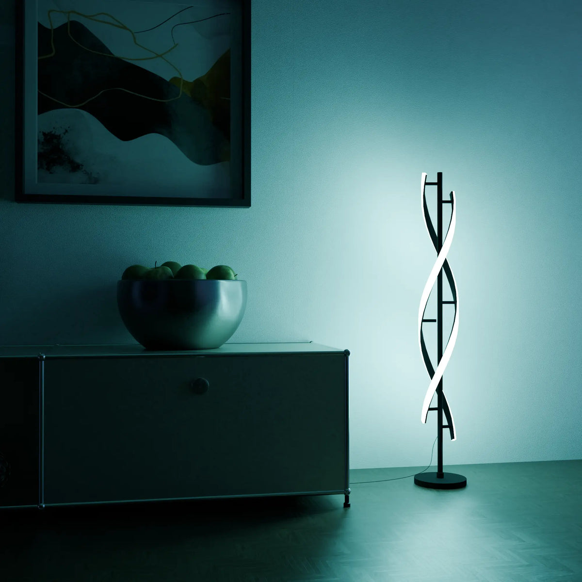 Lámpara de pie LED en espiral Rizena – junto a una cómoda
