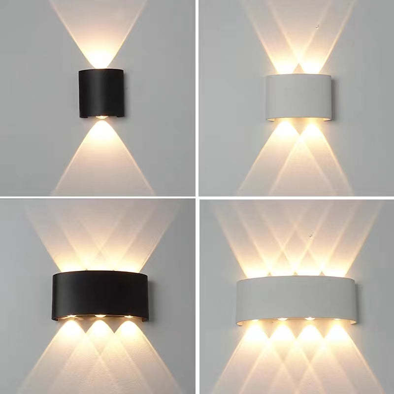 Aplique de pared LED arriba y abajo Fulgara en una fachada iluminada – imagen 4