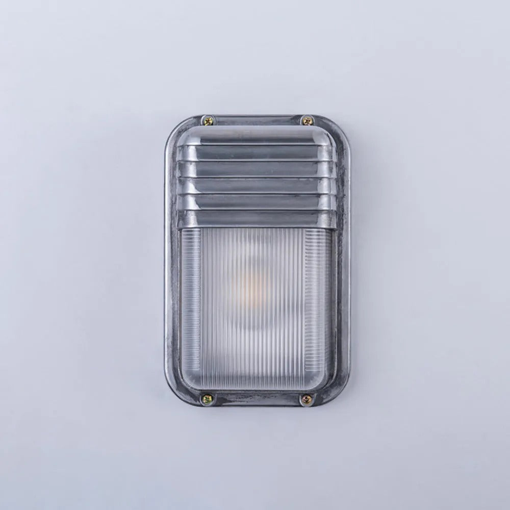 Aplique de pared exterior Marinel – modelo rectangular con visera de lamas