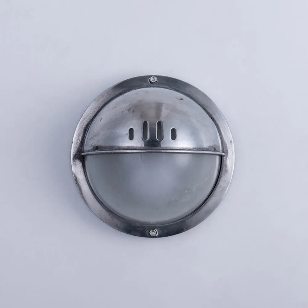 Aplique de pared exterior Marinel – modelo redondo con media visera