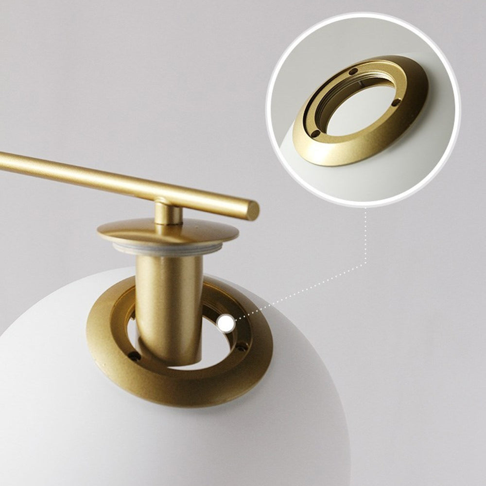Lámpara de pie dorada con globo de cristal Vemira – detalle del soporte del globo