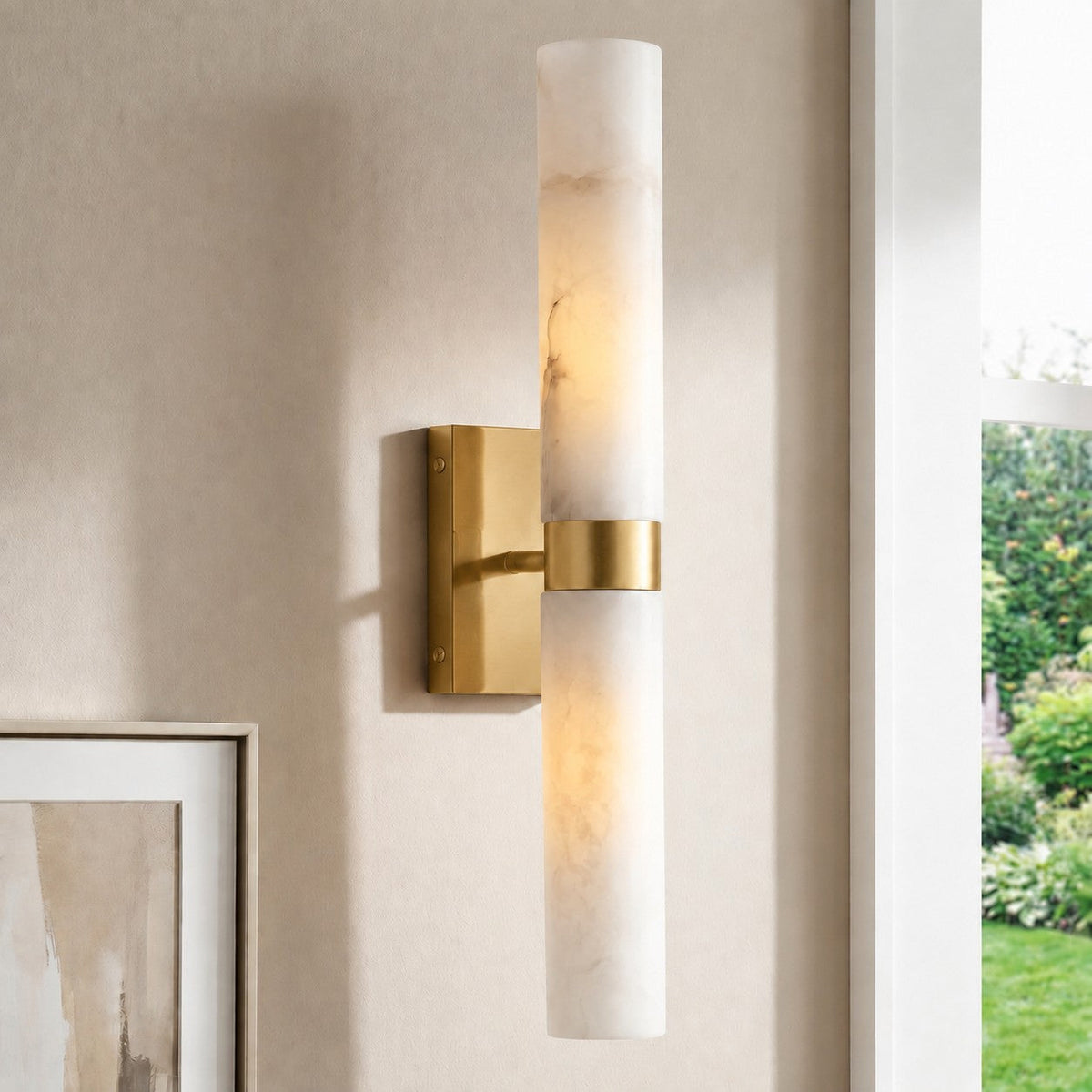 Aplique de pared de doble tubo Melliza junto al espejo de un baño – imagen 7