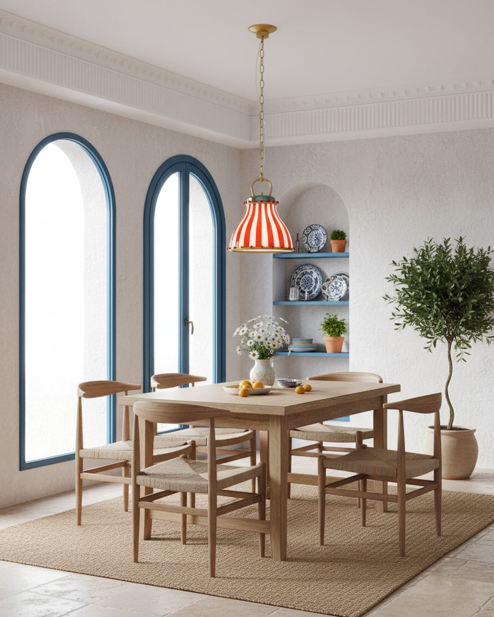Lámpara colgante de cristal a rayas Feriana – en un comedor mediterráneo