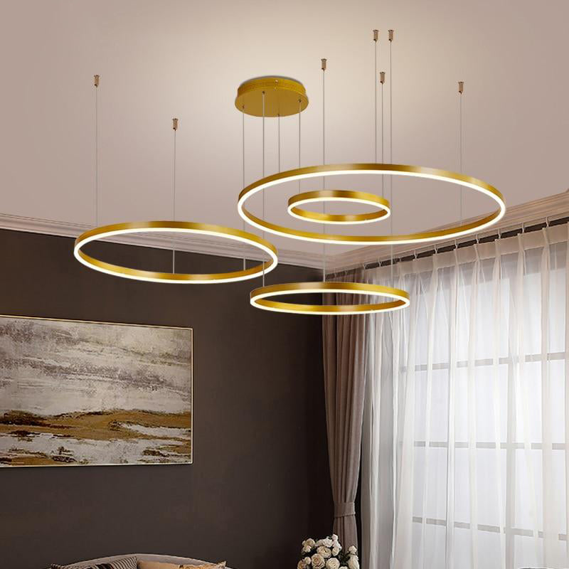 Lámpara colgante LED de aros Saroa en un salón moderno – imagen 7