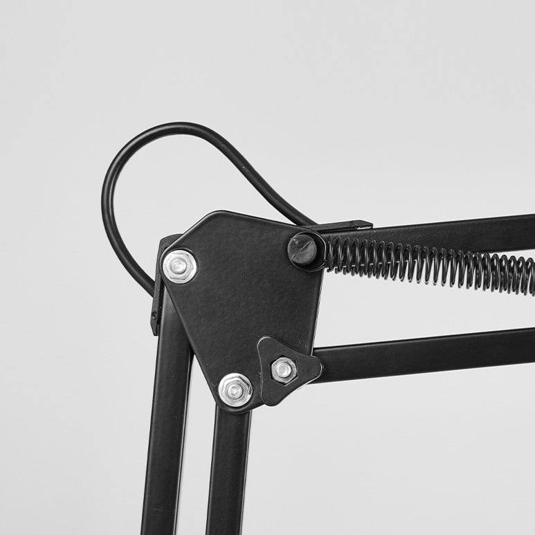 Lámpara de escritorio articulada Flexora – detalle de las articulaciones y muelles del brazo