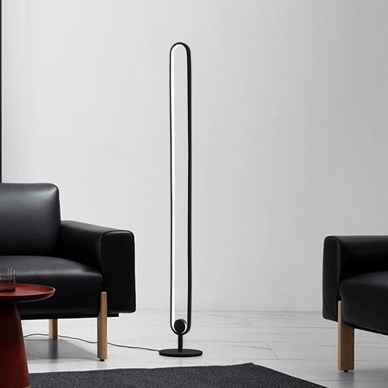 Lámpara de pie LED ovalada Rozalia en un salón minimalista – imagen 6