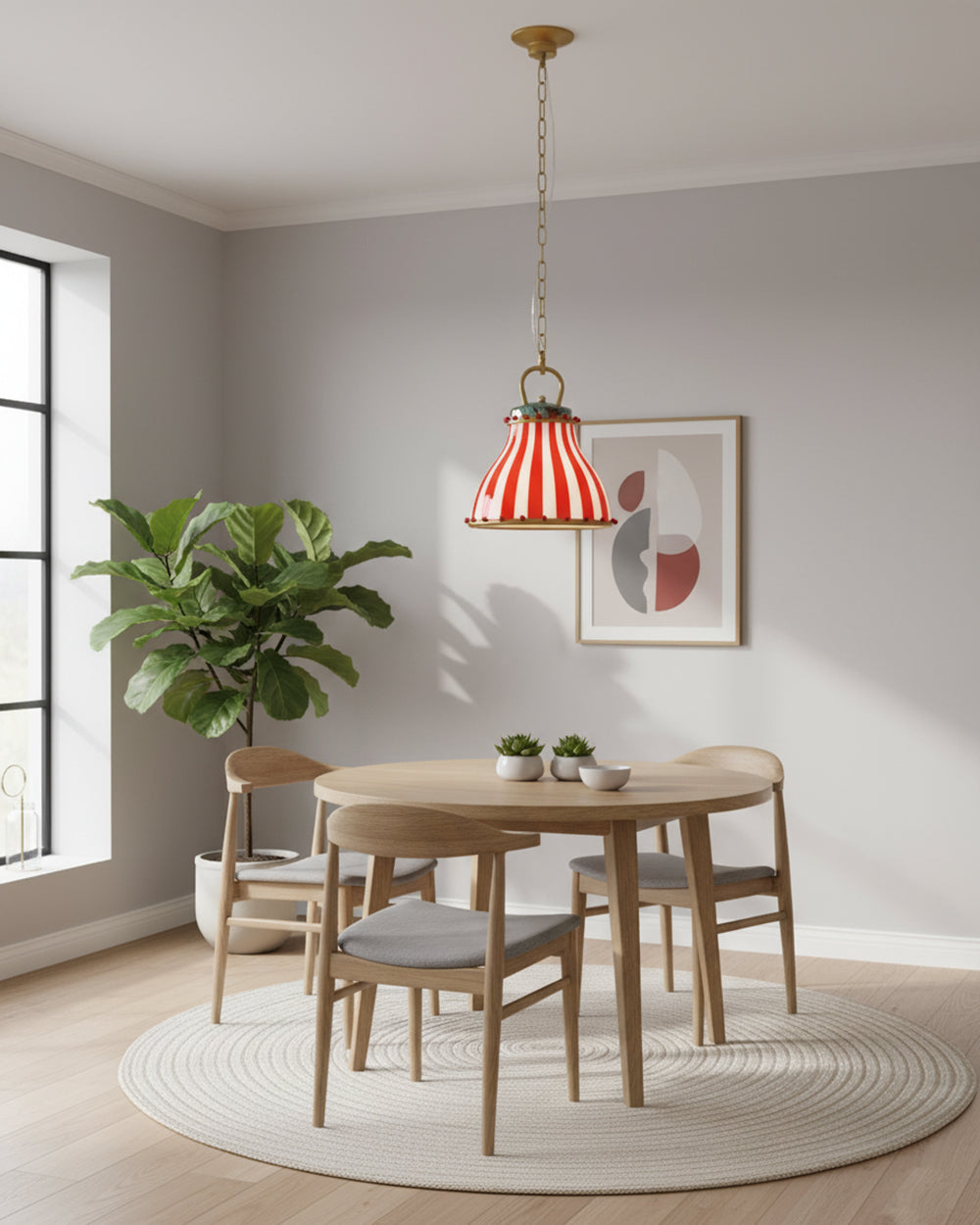 Lámpara colgante de cristal a rayas Feriana – en un comedor luminoso