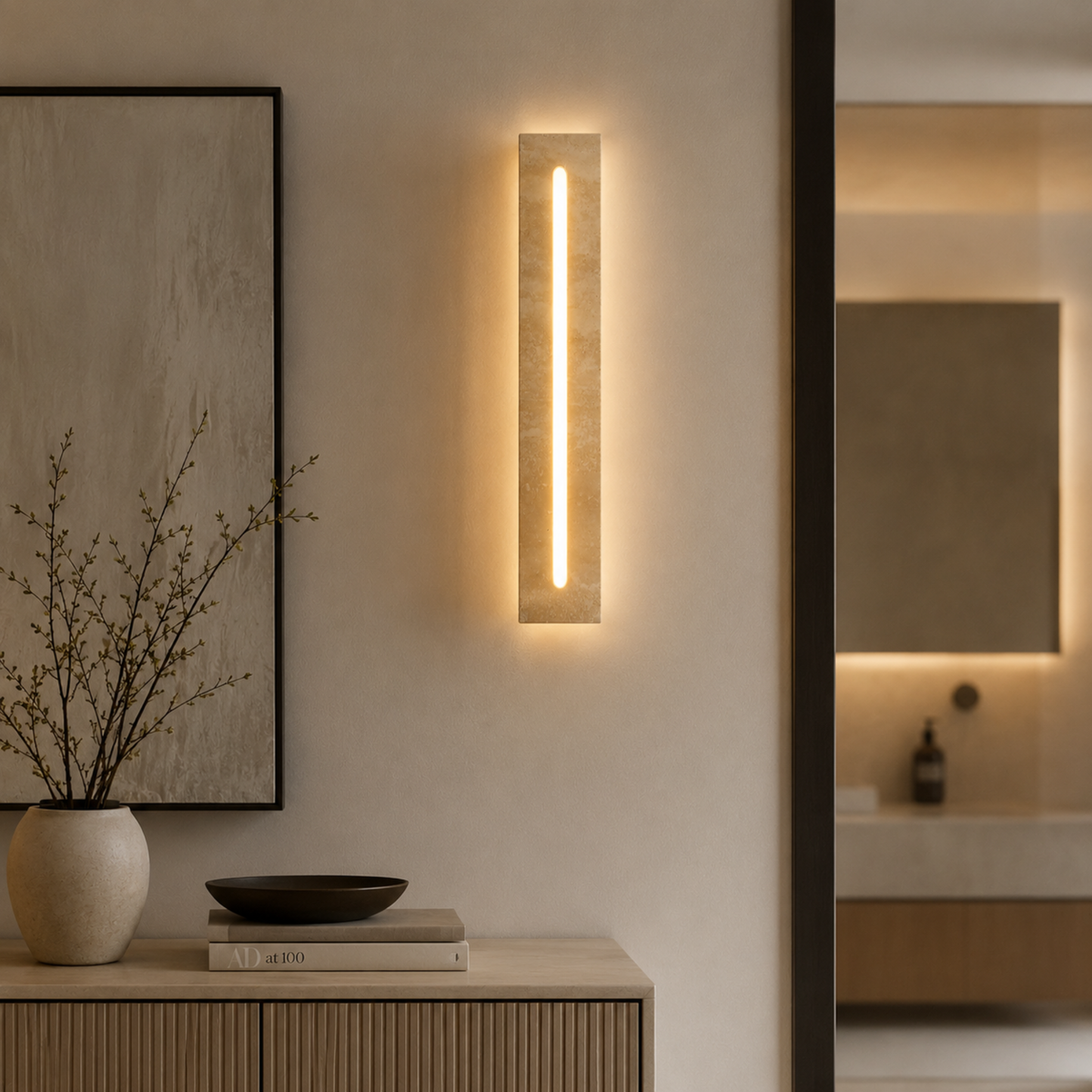 Aplique de pared exterior Urcalia de travertino – junto a un mueble de entrada