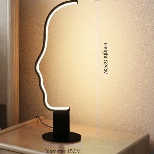 Lámpara de pie LED con silueta de rostro Quiara – versión de mesa