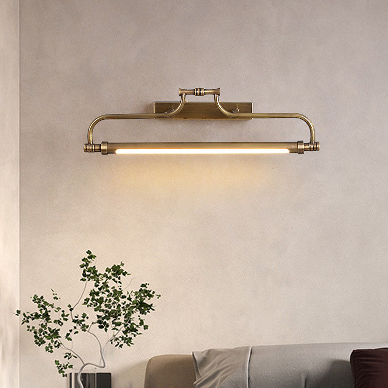 Aplique LED para cuadros de latón Lirama – encendido en el salón