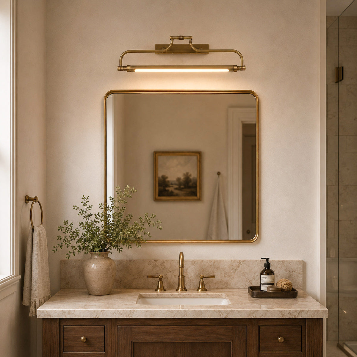 Aplique LED para cuadros de latón Lirama – sobre el espejo del baño
