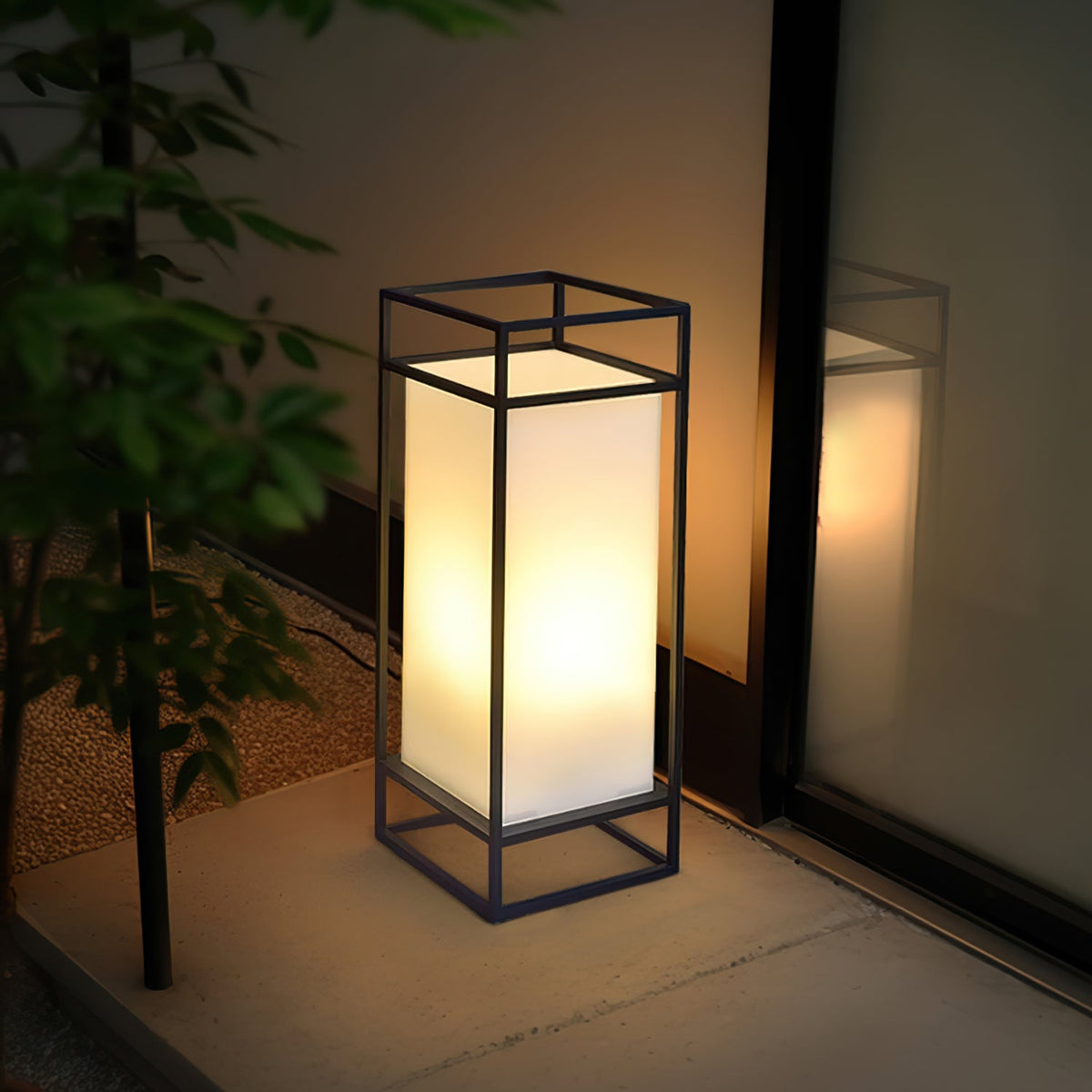 Farol de mesa para exterior Candilo en una terraza al anochecer – imagen 5
