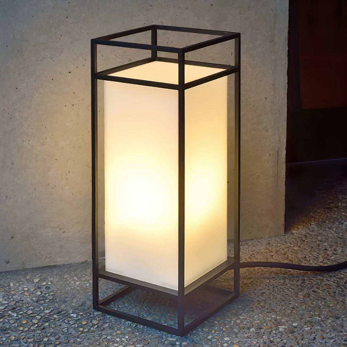 Farol de mesa para exterior Candilo en una terraza al anochecer – imagen 21