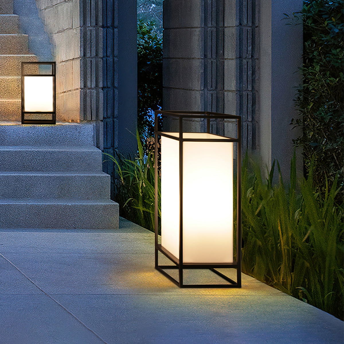 Farol de mesa para exterior Candilo en una terraza al anochecer – imagen 8