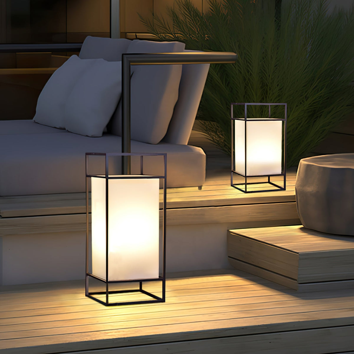 Farol de mesa para exterior Candilo en una terraza al anochecer – imagen 9