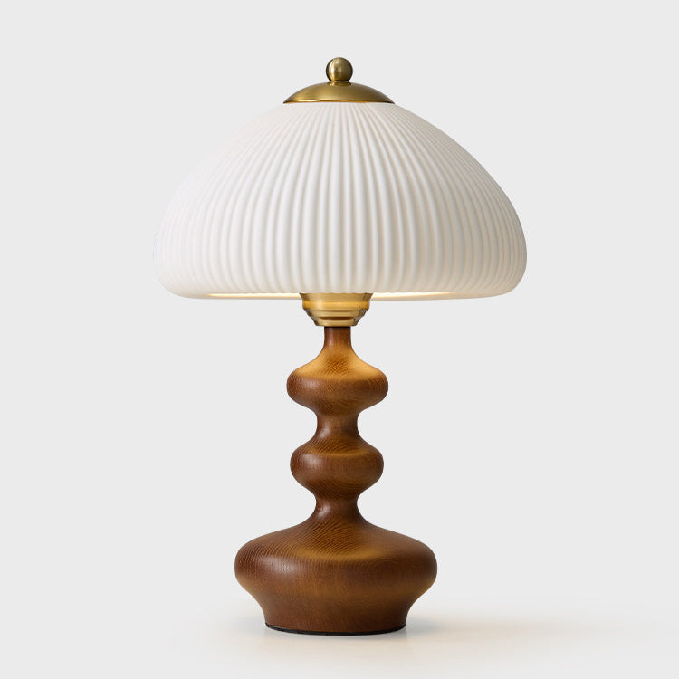 Lámpara de mesa de madera torneada Ruecola – en nogal con detalle dorado