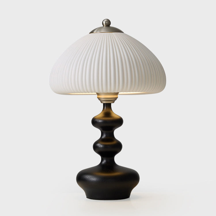 Lámpara de mesa de madera torneada Ruecola – en negro con detalle niquelado