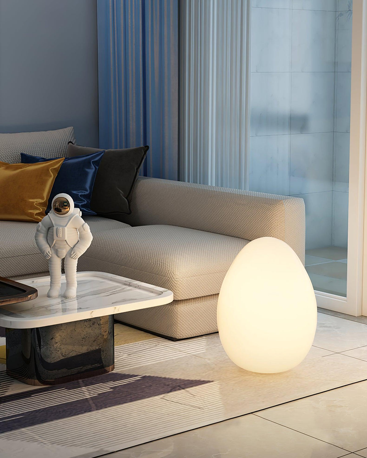 Lámpara de mesa en forma de huevo Ovalia en un salón acogedor – imagen 18