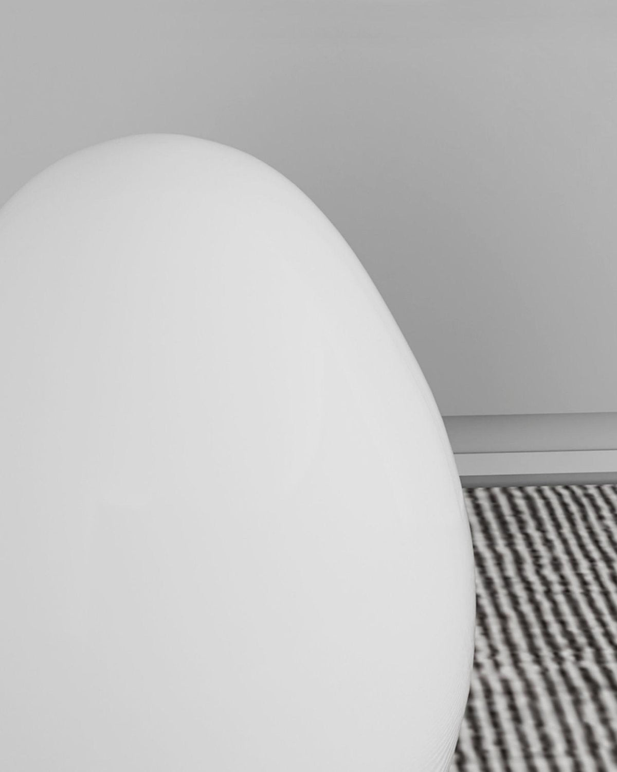 Lámpara de mesa en forma de huevo Ovalia en un salón acogedor – imagen 19