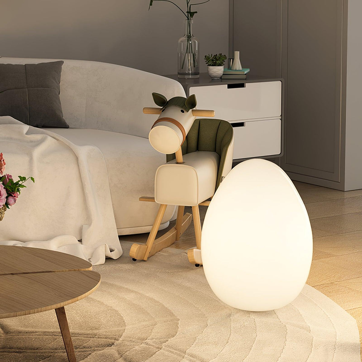 Lámpara de mesa en forma de huevo Ovalia en un salón acogedor – imagen 5