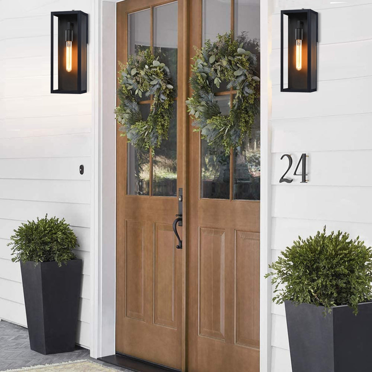 Farol de pared exterior Kelina – a ambos lados de una puerta de entrada