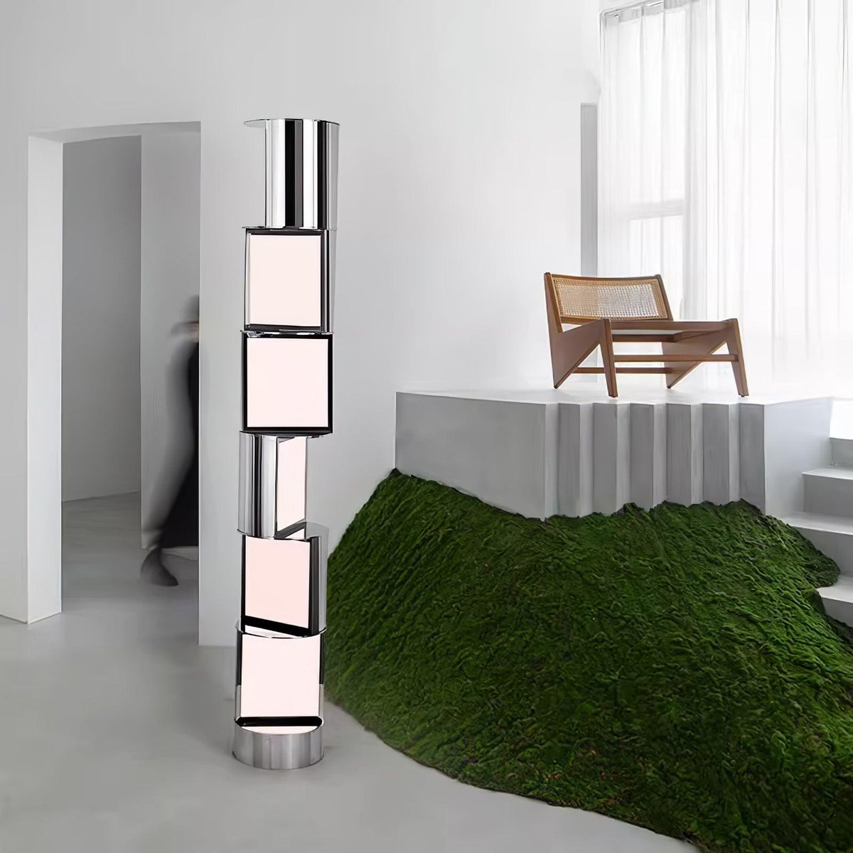 Lámpara de pie LED columna de acero y acrílico Gelara en un salón de diseño – imagen 12