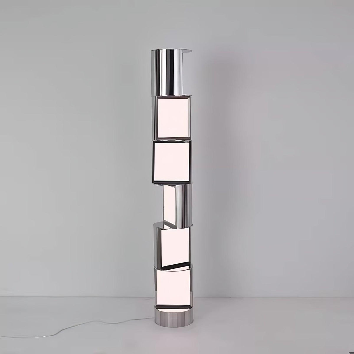 Lámpara de pie LED columna de acero y acrílico Gelara en un salón de diseño – imagen 15