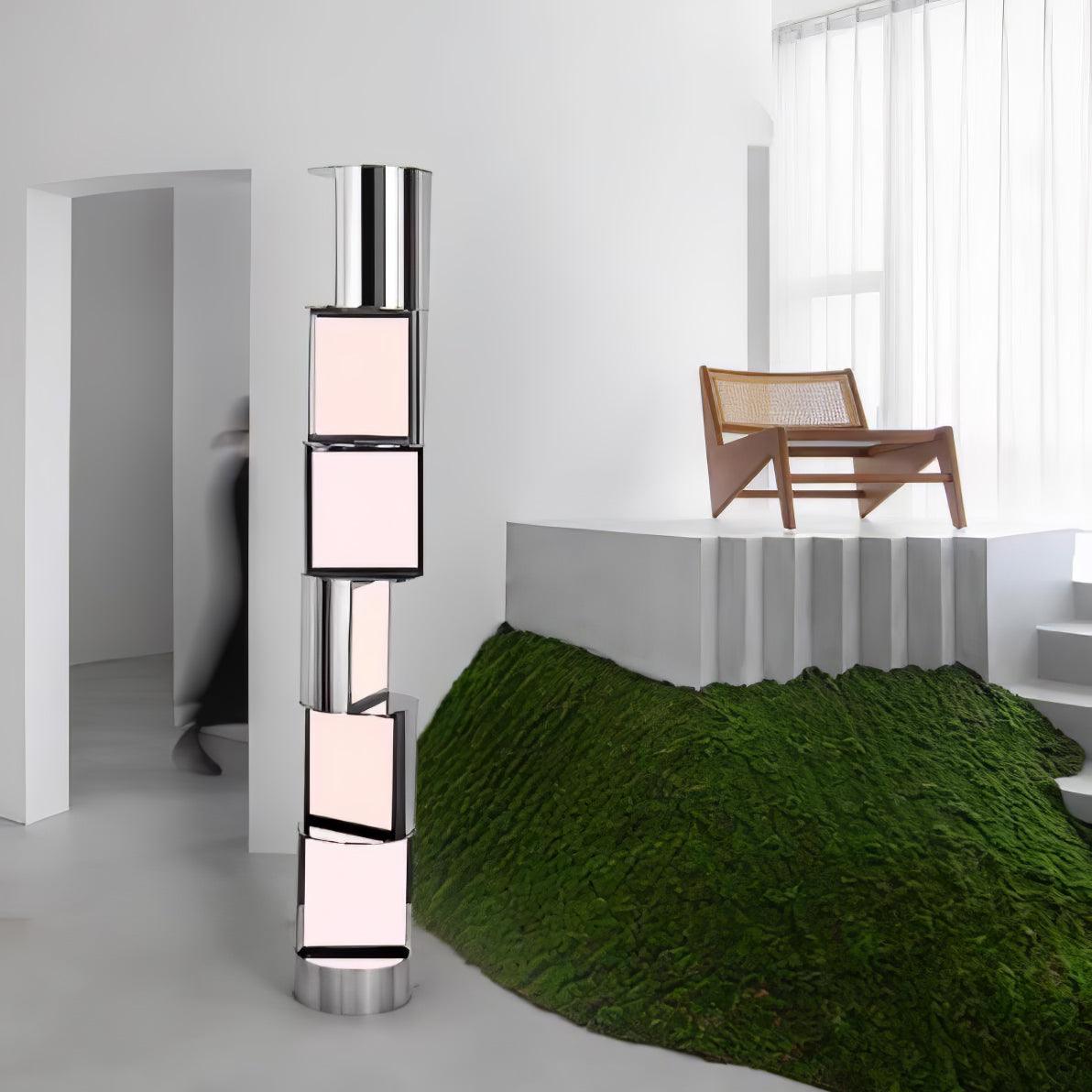 Lámpara de pie LED columna de acero y acrílico Gelara en un salón de diseño – imagen 13
