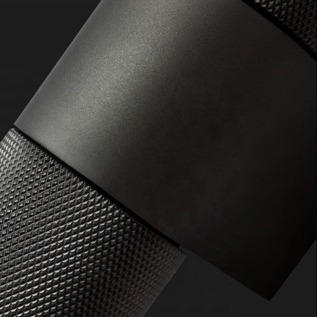 Aplique de pared exterior Nacira – detalle del acabado moleteado