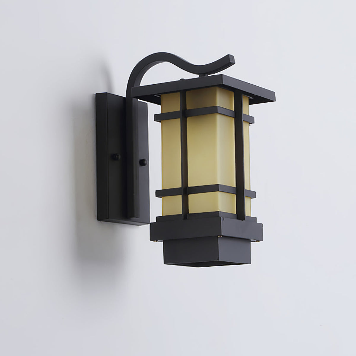 Aplique de pared exterior farol Jilaro – vista lateral sobre pared gris