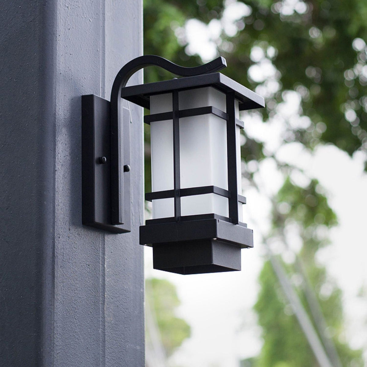 Aplique de pared exterior farol Jilaro – apagado en una columna