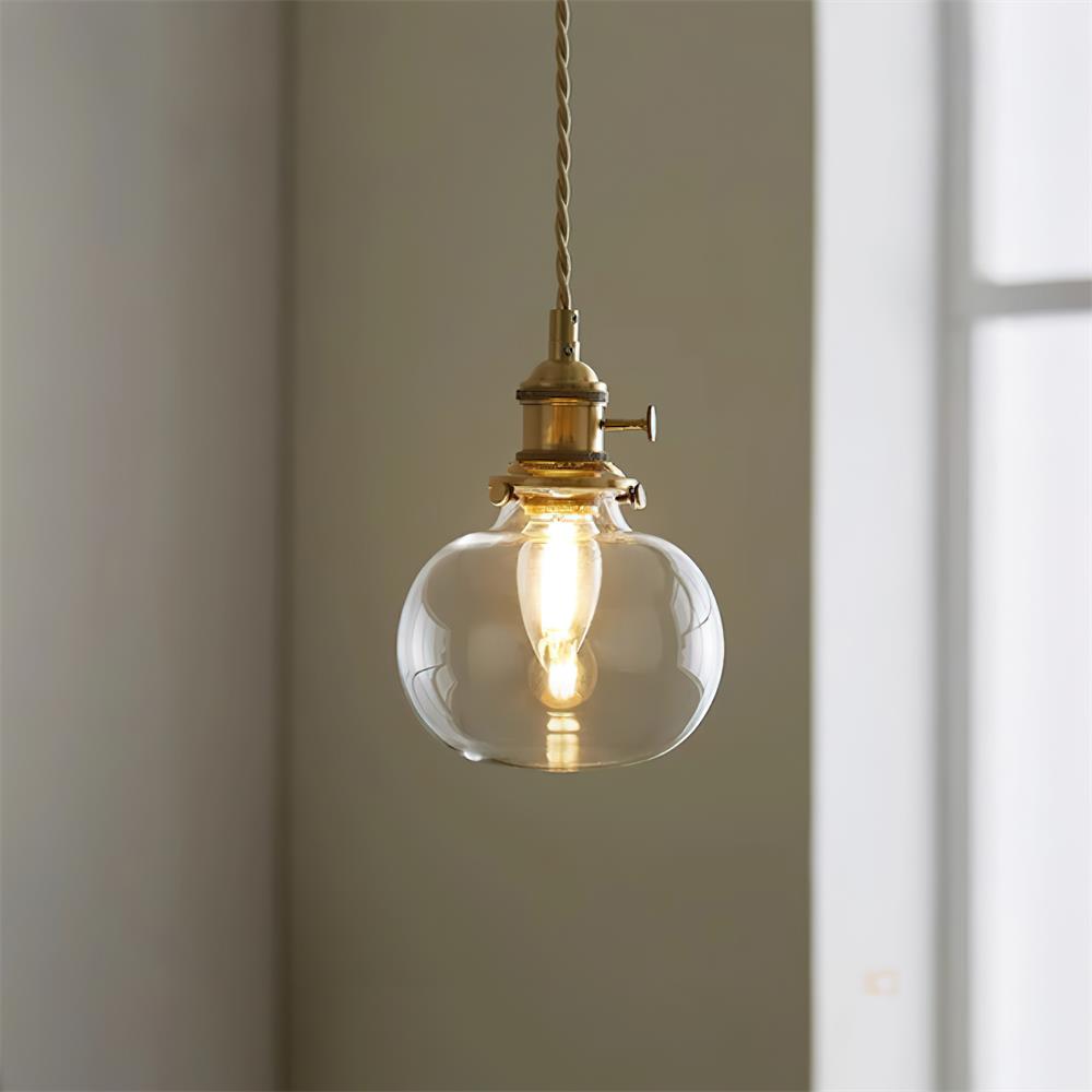 Lámpara colgante de cristal y latón Faroli – con pantalla de cristal en forma de globo
