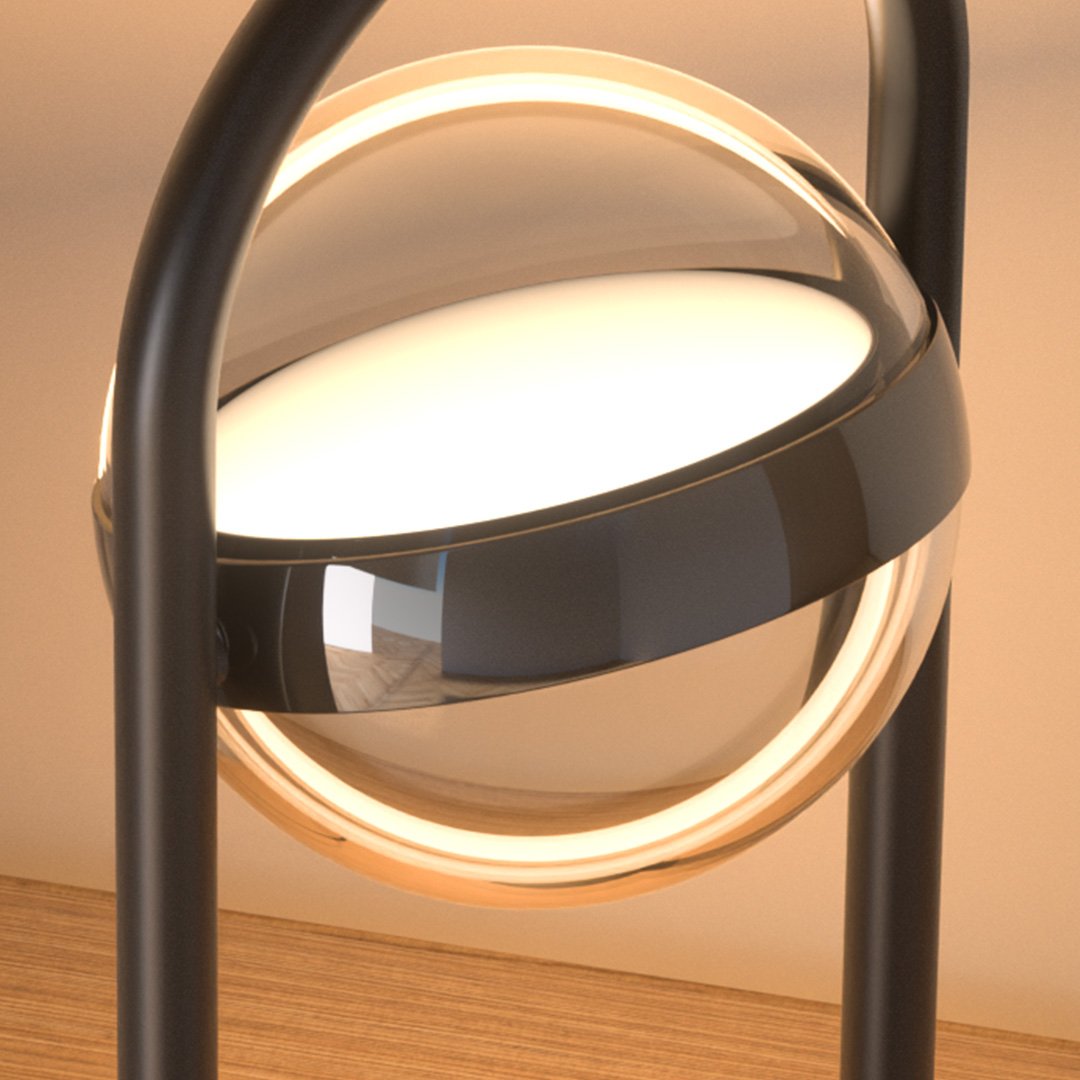 Lámpara de mesa LED Nimbela sobre un escritorio de madera – imagen 5