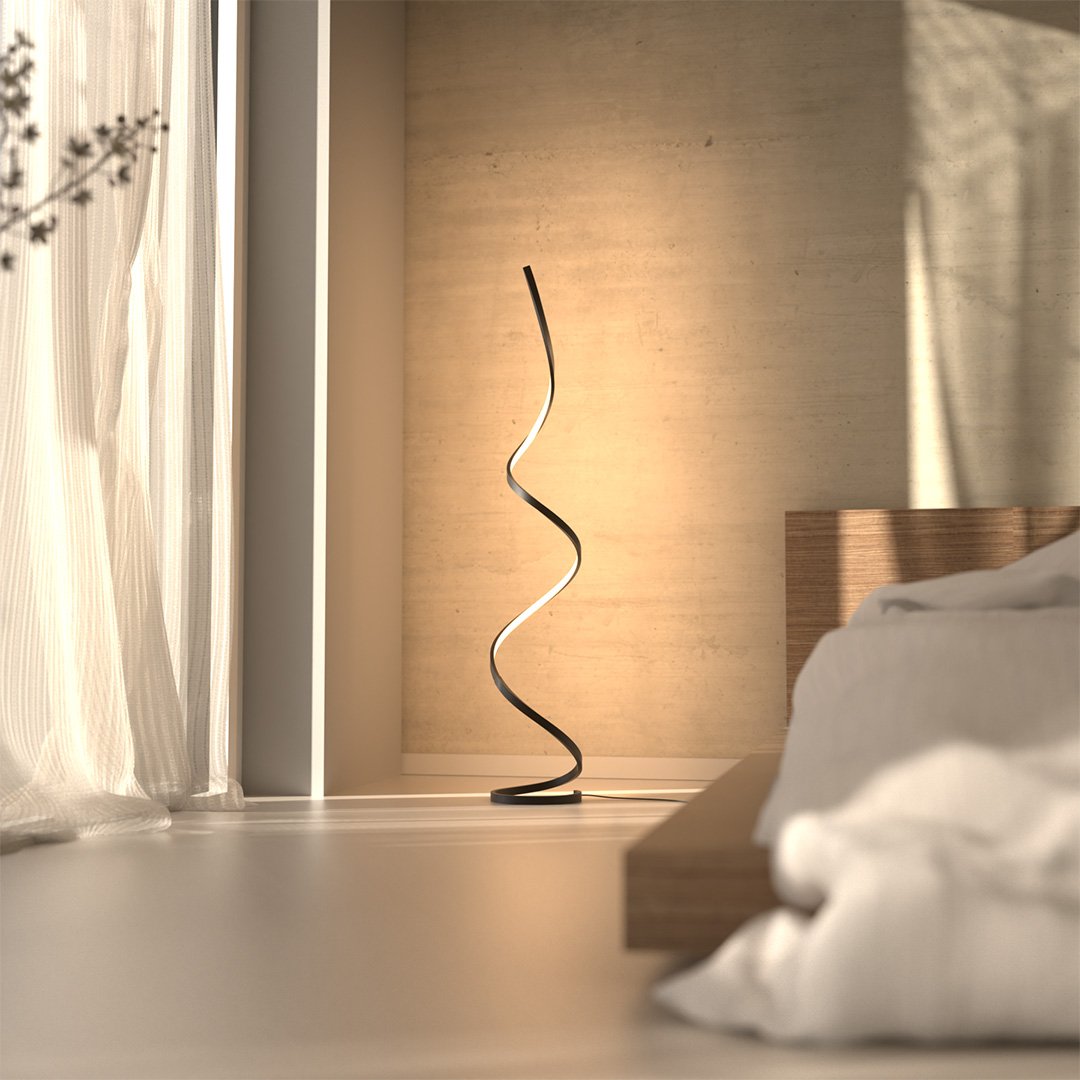 Lámpara de pie LED en espiral Rizela en un dormitorio sereno – imagen 4