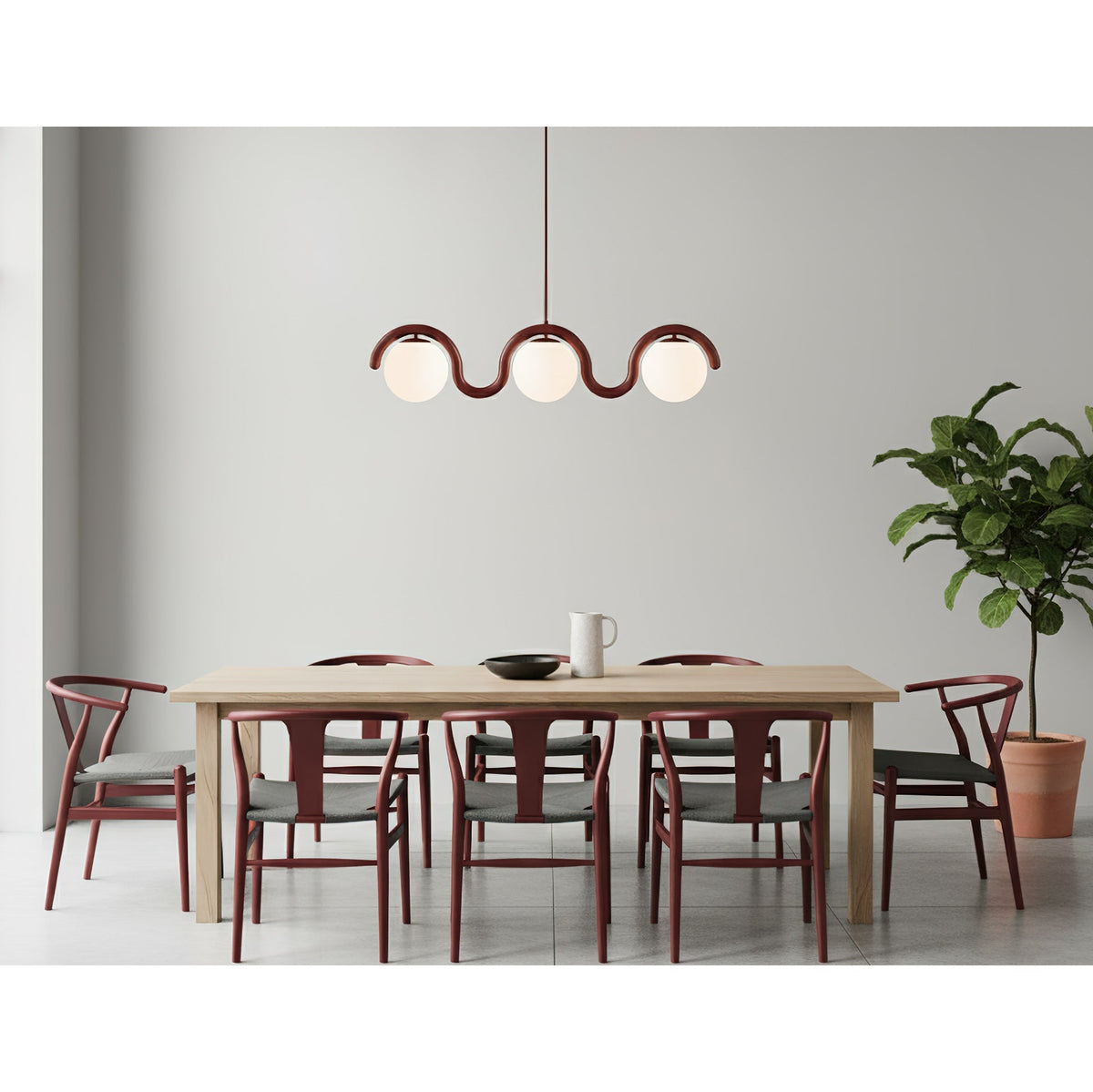 Lámpara araña lineal Bucle sobre una mesa de comedor – imagen 11