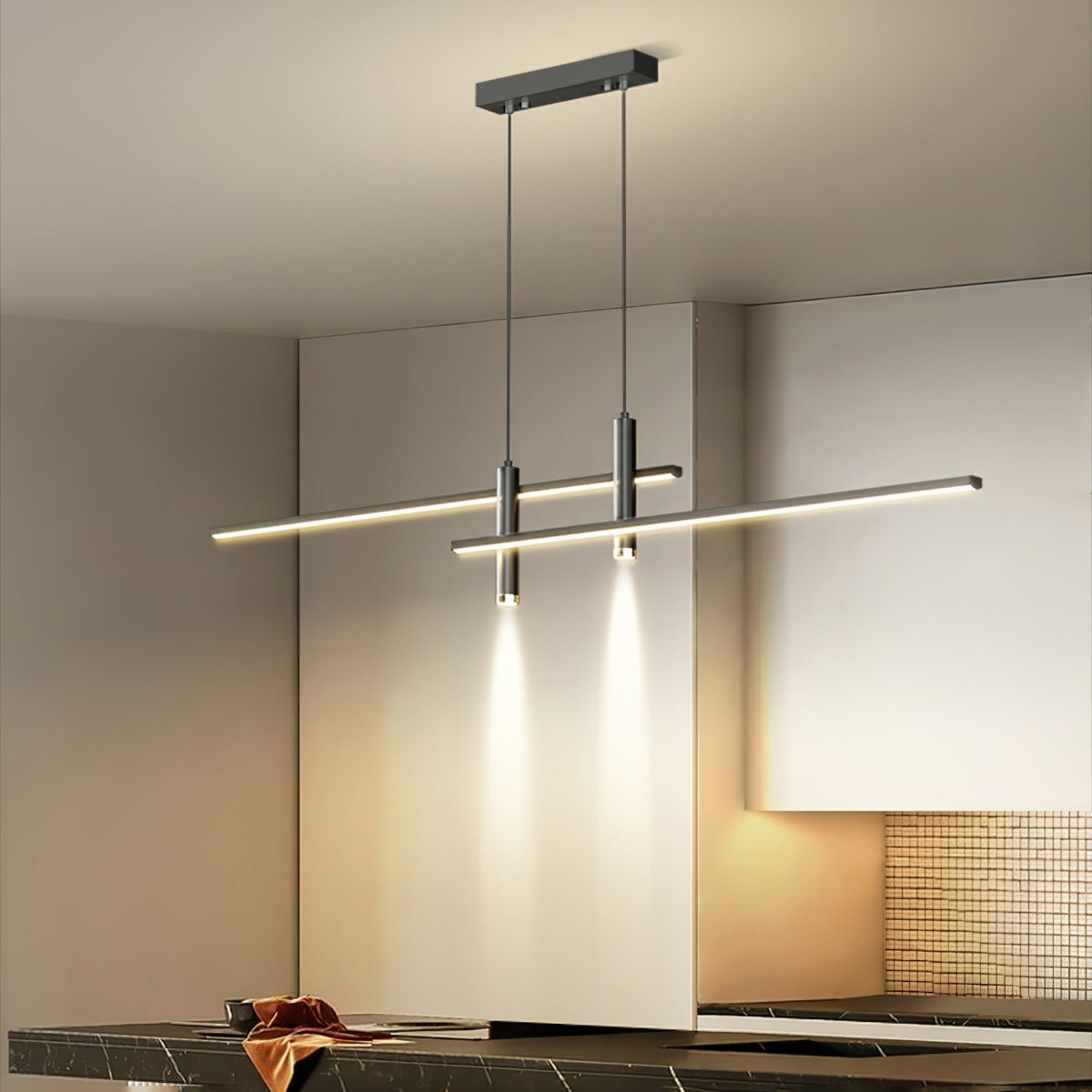 Lámpara colgante LED lineal Quilla sobre una isla de cocina – imagen 9
