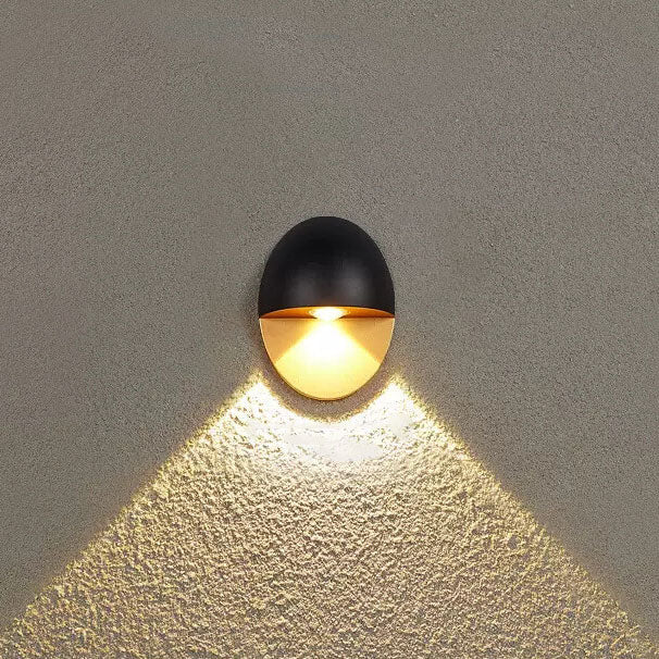 Aplique de pared exterior Yolena ovalado – negro y dorado con luz cálida