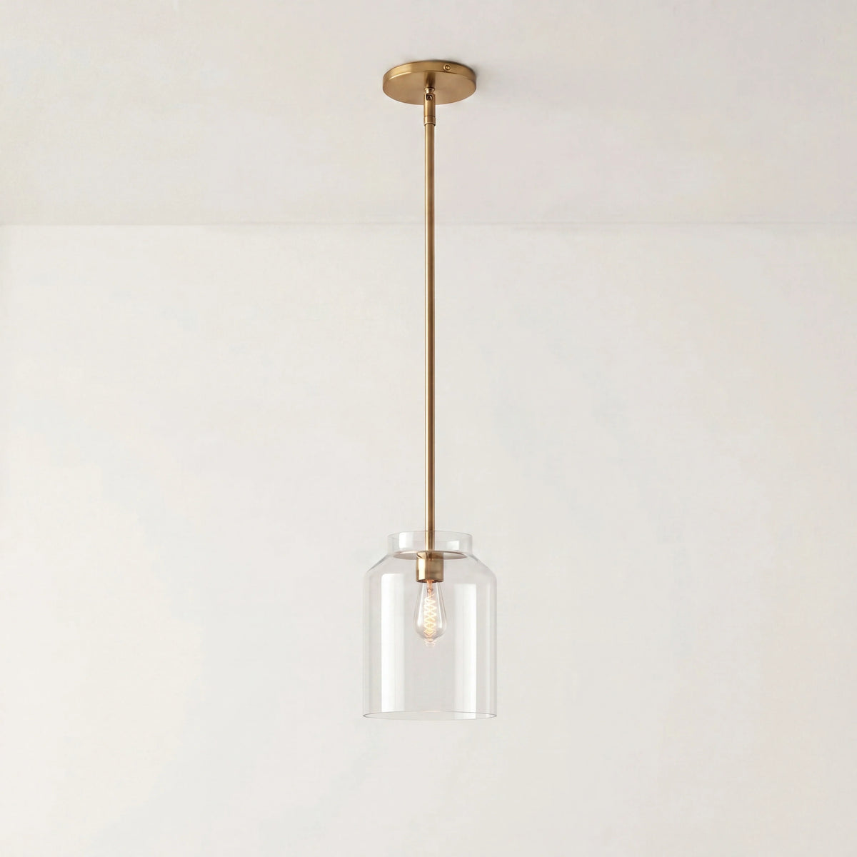 Lámpara colgante nórdica Salvena – Ø 19 cm, cristal transparente, latón envejecido