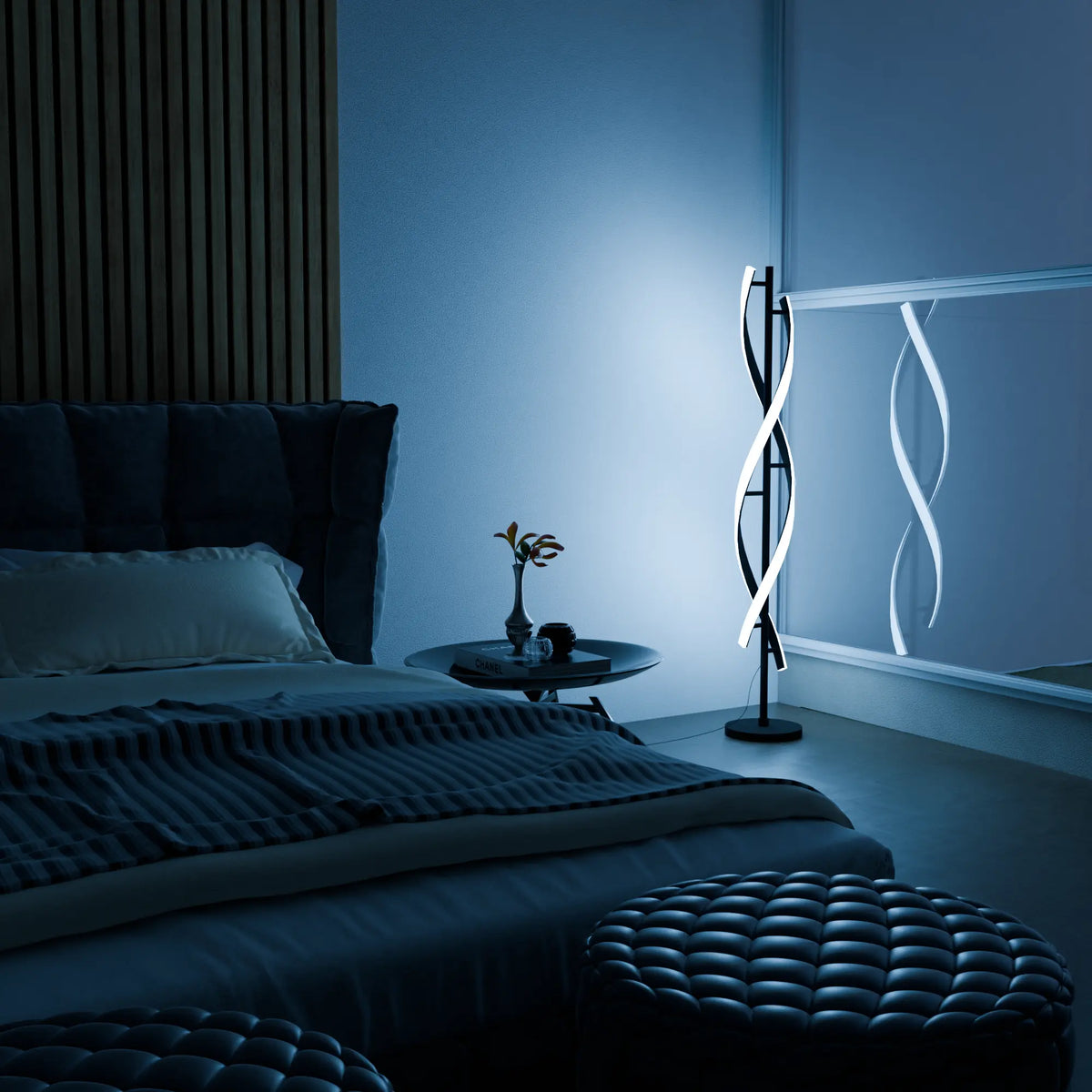 Lámpara de pie LED en espiral Rizena – en un dormitorio