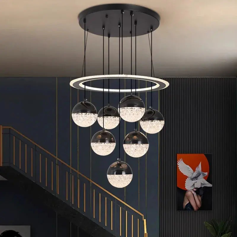 Lámpara de araña LED Anillo – en negro en el hueco de una escalera
