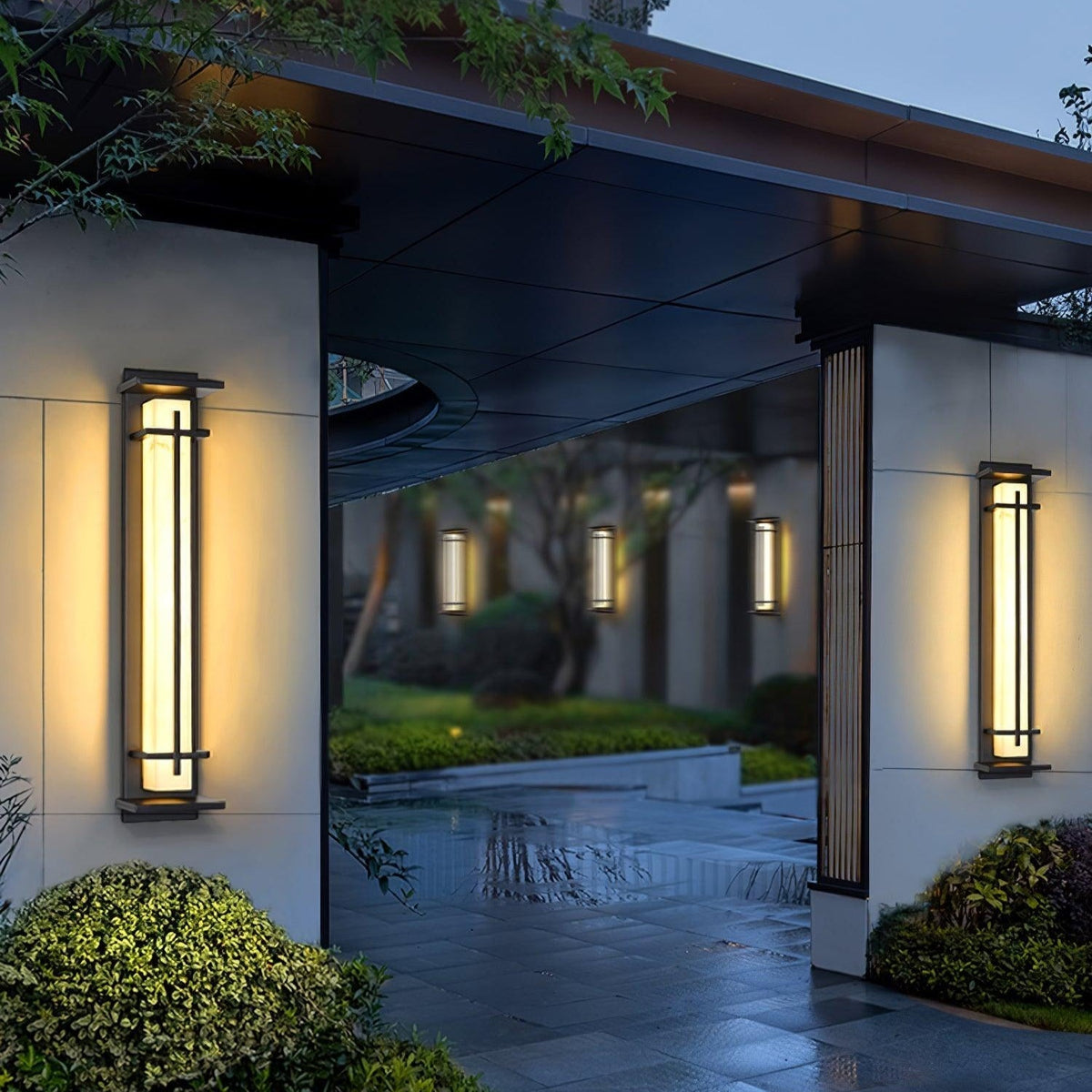 Aplique de pared exterior LED Xalba con efecto alabastro – a ambos lados de un pasillo exterior