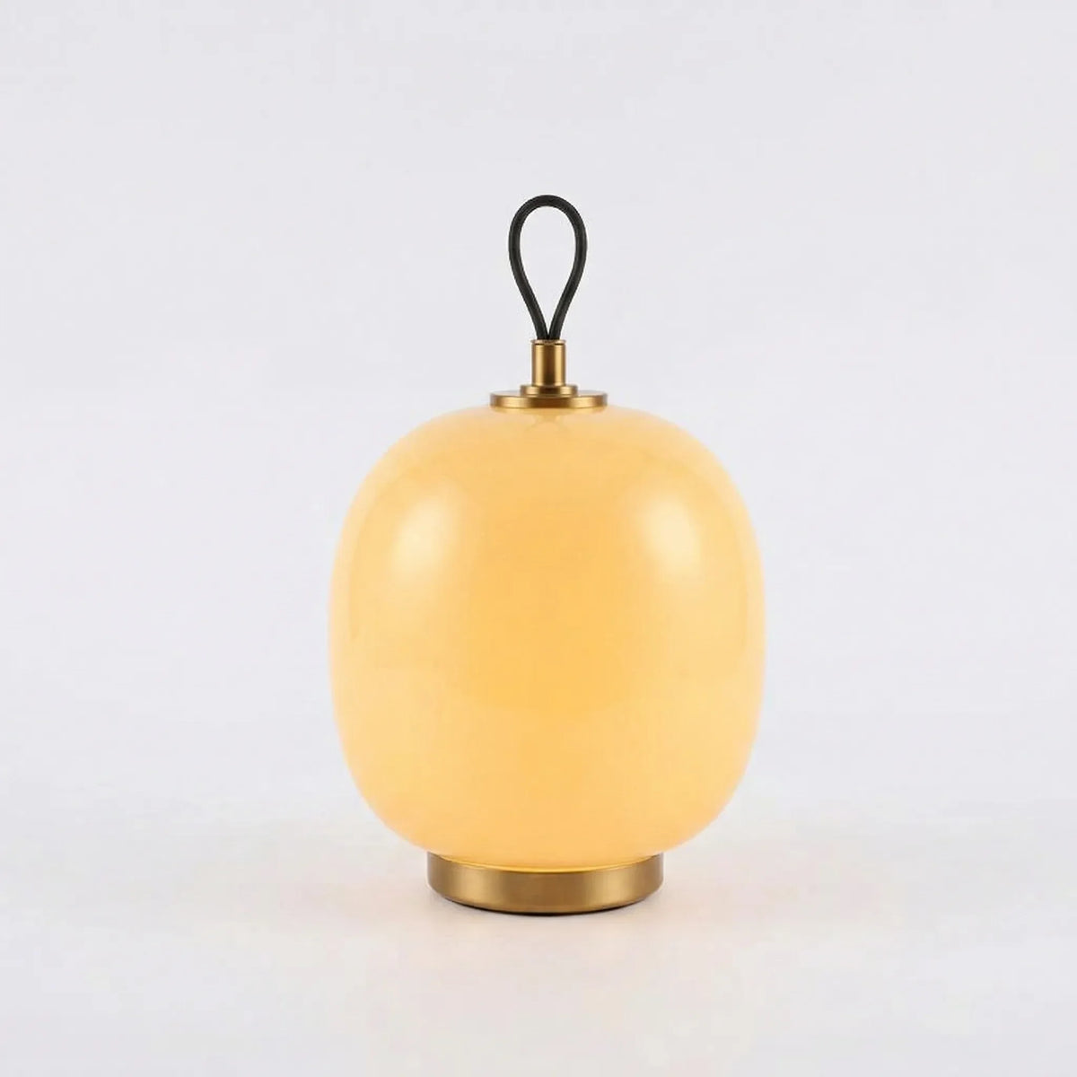Lámpara de mesa portátil de cristal Calabra – en amarillo mantequilla