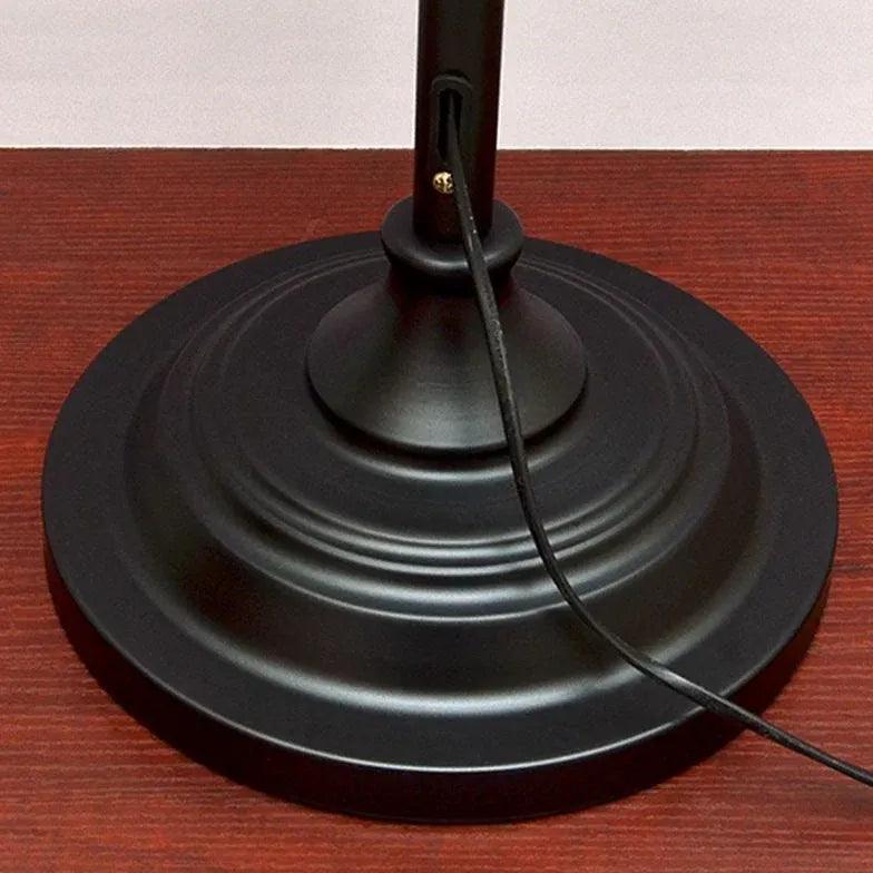 Lámpara de pie estilo farol negra Ormina – detalle de la base redonda