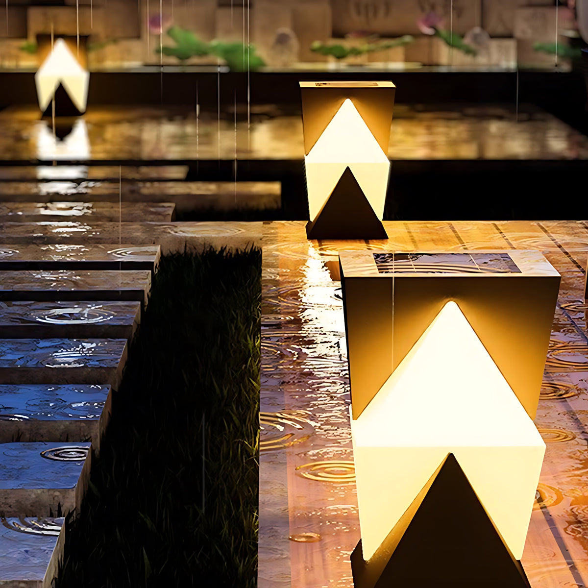 Luz de pilar exterior Oniela en un jardín – imagen 10