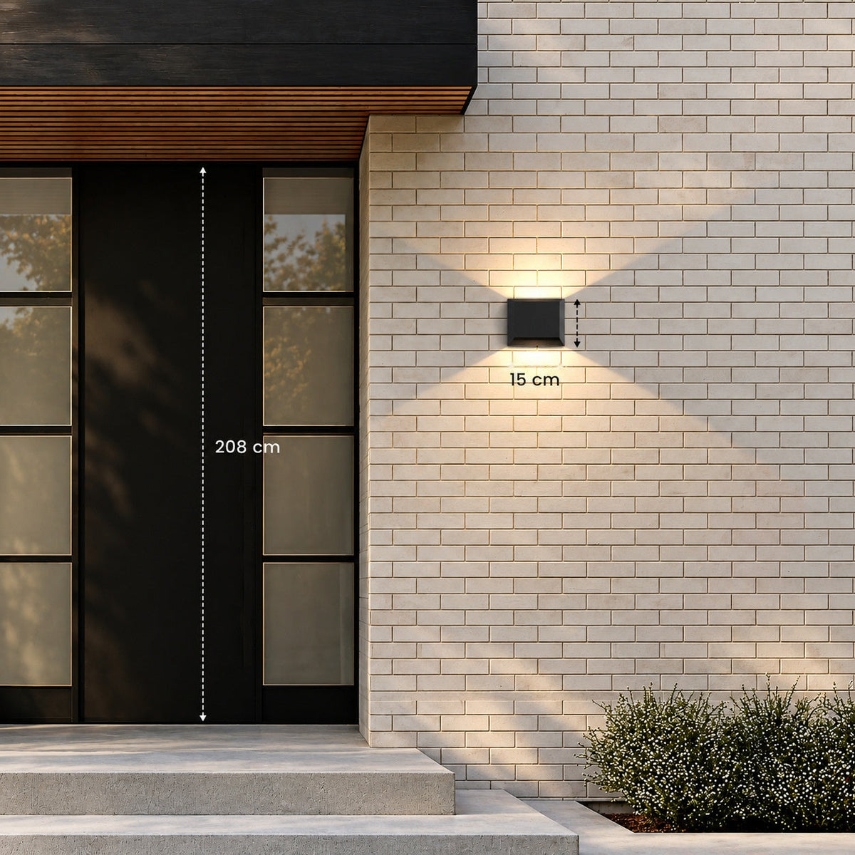 Aplique de pared exterior LED cuadrado Jomarel – junto a una puerta de entrada con medidas de altura