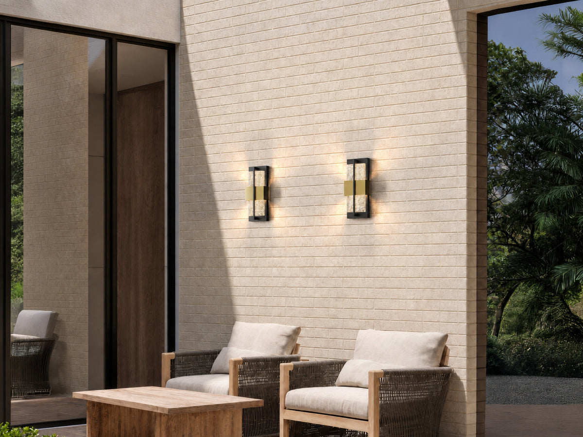Aplique de pared exterior LED Zestrela – pareja de apliques en una terraza de ladrillo